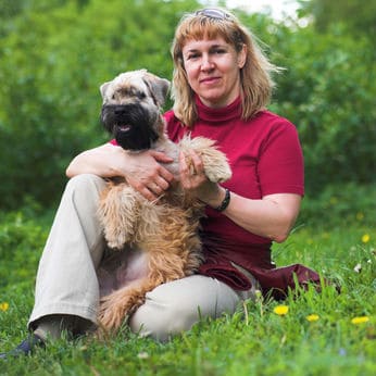 soft-coated-wheaten-terrier and woman