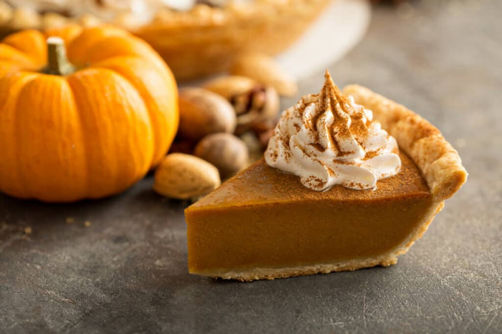 Photo of Traditional Pumpkin Pie With Whipped Cream